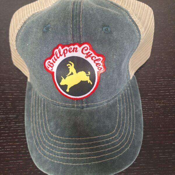 Green trucker cap with bull rider logo