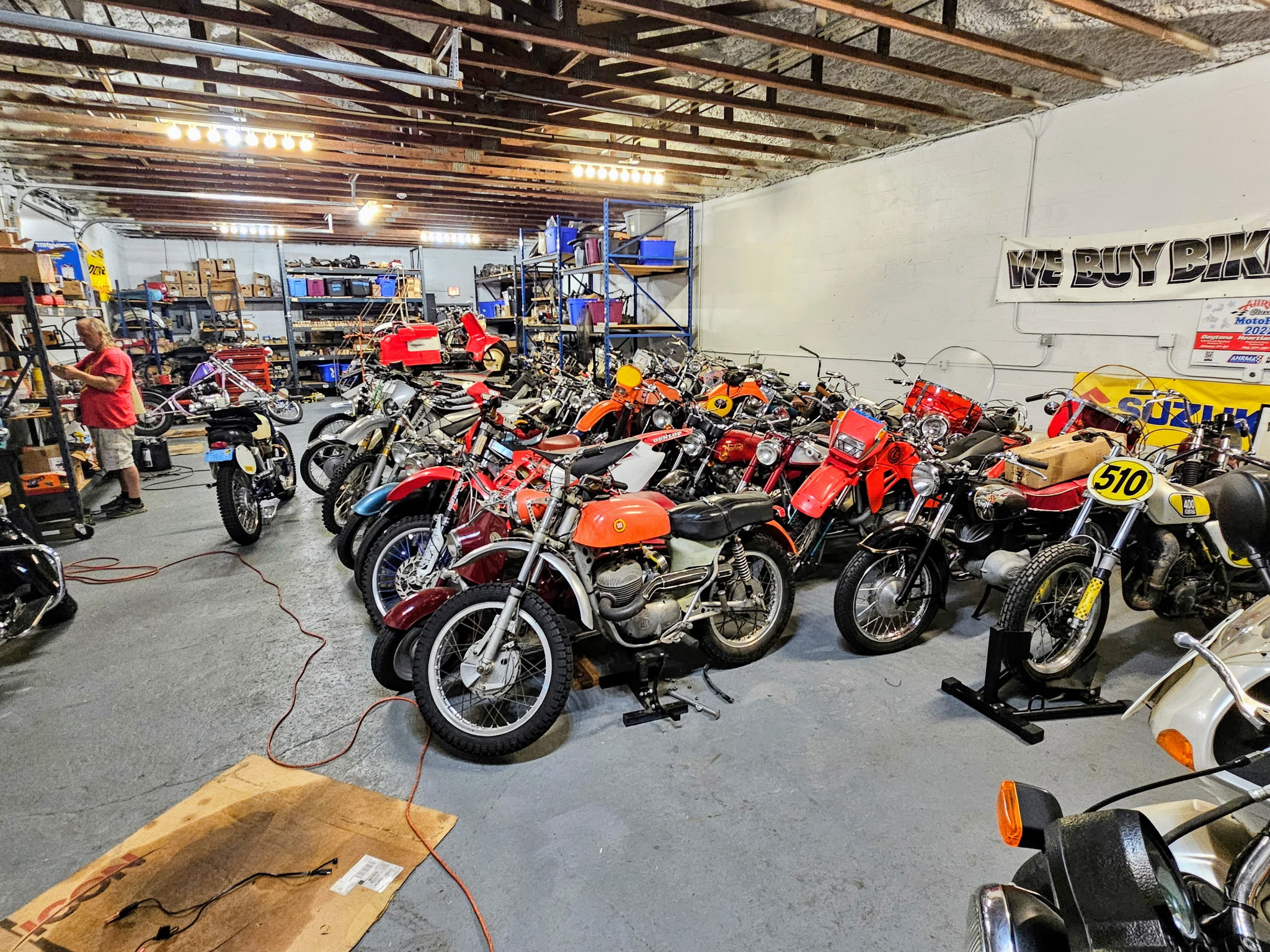 Row of vintage motorcycles in workshop garage