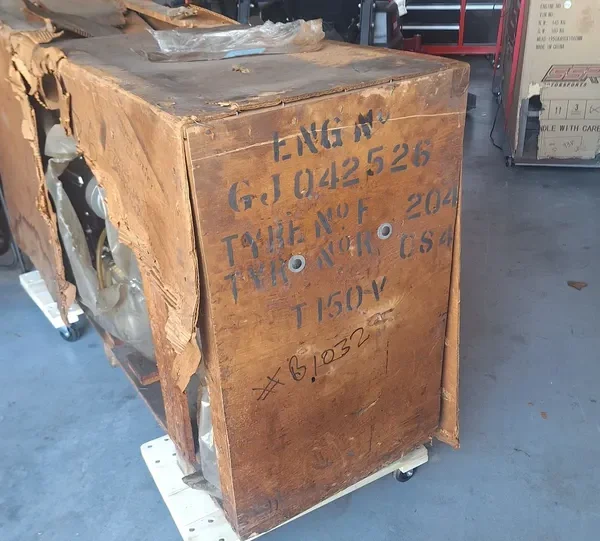 Weathered crate in garage setting
