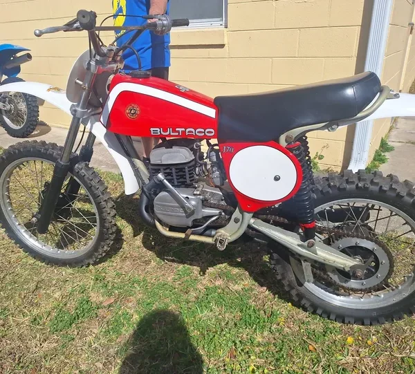 Off-road motorcycle near building