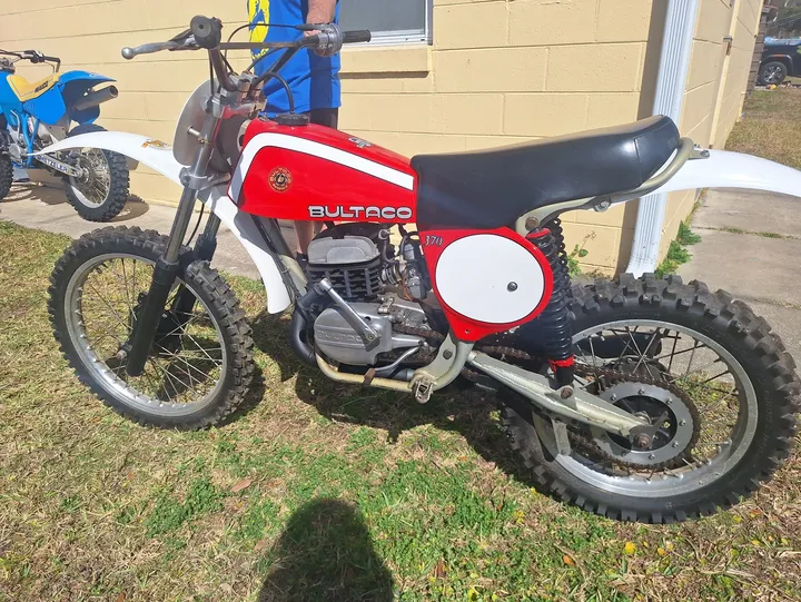 Off-road motorcycle near building